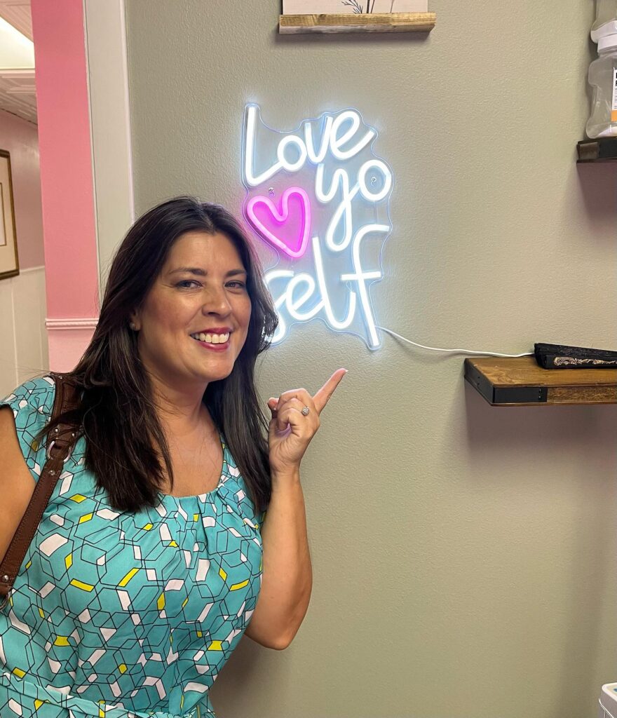 Elsie Mendez connecting with women at an event